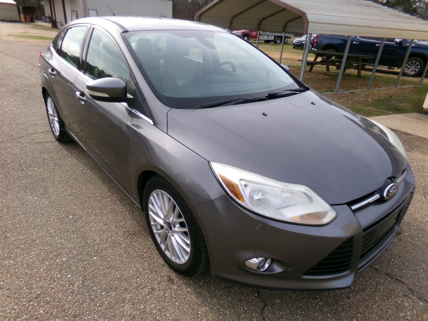 2012 Sterling Gray Metallic /tan Ford Focus SEL (1FAHP3H26CL) with an 2.0L engine, automatic transmission, located at 401 First NE, Bearden, AR, 71720, (870) 687-3414, 33.726528, -92.611519 - Photo#22